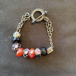 Bead and silver chain bracelet.